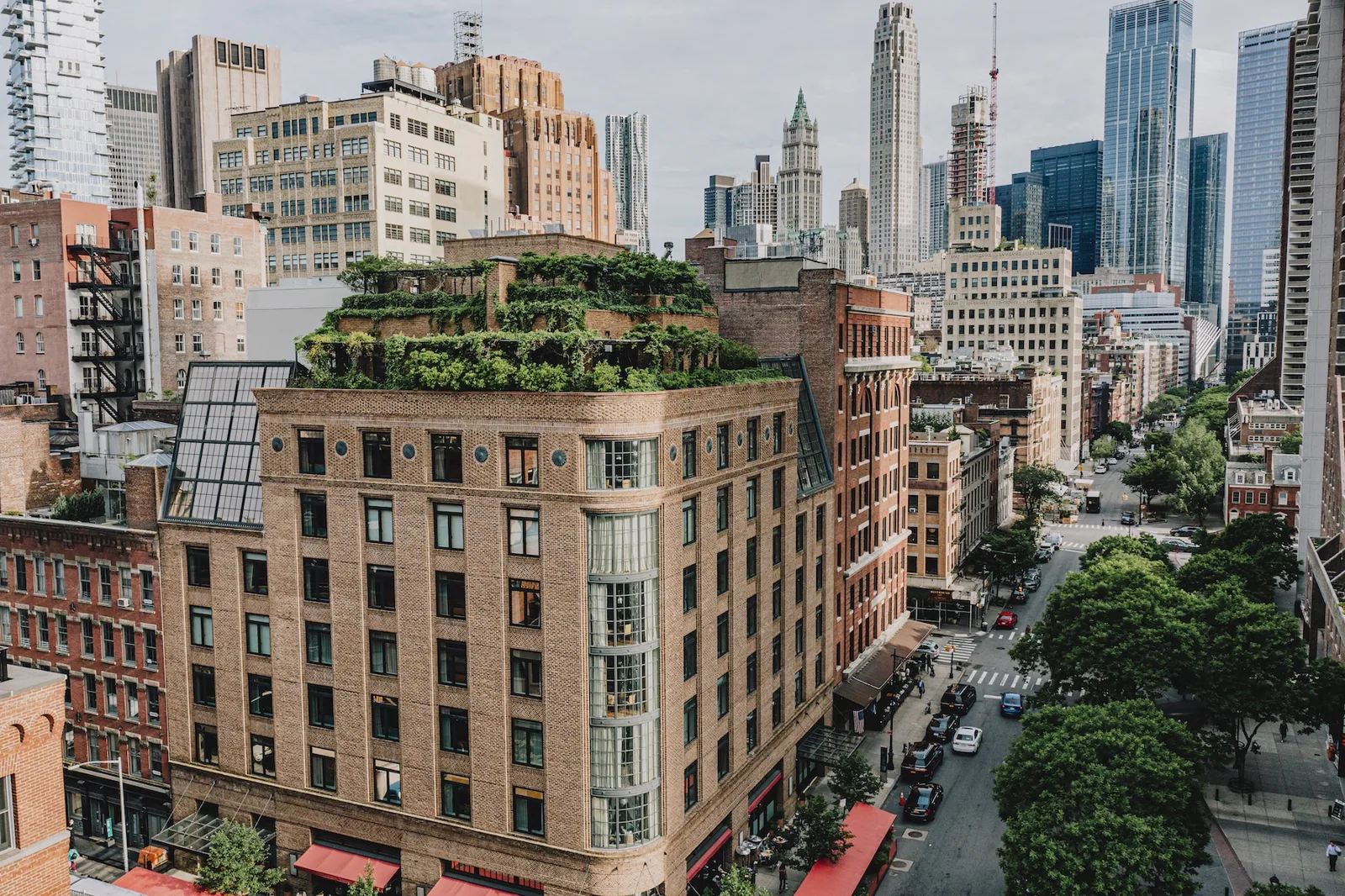 Brick and brownstone buildings with rooftops in Manhattan